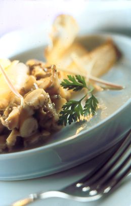 Whelk and Smoked Haddock Fricassée with Celeriac Chips