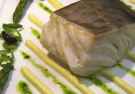 Slice of salt cod with seasonal vegetables, Gaeta olives and confit tomatoes