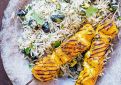Rice pilaf with California prunes and yogurt chicken brochettes
