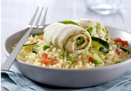 Fish with pesto and little vegetables in parchment